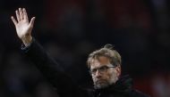 Liverpool manager Juergen Klopp waves to fans after the game. (Reuters / Phil Noble)