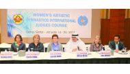 Qatar Gymnastics Federation (QGF) President Ali Al Hitmi (third right) and experts from the International Gymnastics Federation (FIG) (left to right) Helena Diaz, Radi Zinal, Donattela Sacchi, Liubov Andrianova and the QGF Technical Director Anis Saoud (r