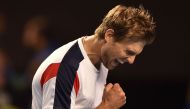 Italy's Andreas Seppi celebrates his win against Australia's Nick Kyrgios during their men's singles match on day three of the Australian Open tennis tournament in Melbourne on January 18, 2017. AFP / PETER PARKS