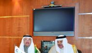 GCC Secretary-General Dr Abdullatif bin Rashid Al Zayani (right) with GOIC's Secretary-General Abdulaziz bin Hamad Al Ageel in Doha, yesterday. 
