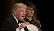 (L-R) President Donald Trump speaks as his wife First Lady Melania Trump looks on during A Salute To Our Armed Services Inaugural Ball at the National Building Museum on January 20, 2017 in Washington, DC. Alex Wong/AFP
