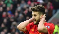 Liverpool's English midfielder Adam Lallana reacts after a missed chance during the English Premier League football match between Liverpool and Swansea City at Anfield in Liverpool, north west England on January 21, 2017. AFP / Anthony DEVLIN