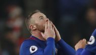 Manchester United's Wayne Rooney celebrates after scoring their first goal to break the all time goalscoring record for Manchester United Reuters / Darren Staples