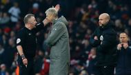 Arsenal's French manager Arsene Wenger (2nd L) is sent to the stands by English referee Jonathan Moss (L) as fourth official Anthony Taylor (R) looks on during the English Premier League football match between Arsenal and Burnley at the Emirates Stadium i