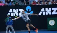 Roger Federer of Switzerland returns the ball to Kei Nishikori (not seen) of Japan during their men's singles match of the Australian Open tennis tournament at Hisense Arena in Melbourne, Australia on January 22, 2017. ( Recep ?akar - Anadolu Agency )