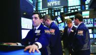 Traders work on the floor of the New York Stock Exchange (NYSE) in New York City, in the US.