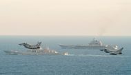 RAF Typhoons monitor Russian warships Pyotr Velikiy and the Admiral Kuznetsov (rear) as they pass close to UK territorial waters, in this photograph released in London on January 25, 2017. Ministry of Defence/Crown Copyright 2017/Handout via REUTER