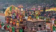Indian performers surround a tableaux representing the state of Tamil Nadu during 68th Republic Day parade in New Delhi on January 26, 2017. AFP / Money SHARMA