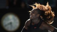 Serena Williams of the US serves against Croatia's Mirjana Lucic-Baroni during their women's singles semi-final match on day 11 of the Australian Open tennis tournament in Melbourne on January 26, 2017. (AFP / SAEED KHAN)