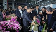 China's Premier Li Keqiang visits a flower market in Kunming, Yunnan province, China January 24, 2017. China Daily via REUTERS