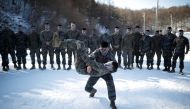South Korean and U.S. Marines demonstrate their martial arts skills in a winter military drill in Pyeongchang, South Korea, January 24, 2017. REUTERS/Kim Hong-Ji
