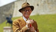  British actor John Hurt poses with his award after receiving a knighthood by Queen Elizabeth during an investiture ceremony at Windsor Castle in Windsor, Britain July 17, 2015. REUTERS/Steve Parsons/pool/File photo
