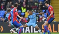 Manchester City's Brazilian striker Gabriel Jesus (C) stretches for the ball during the English FA Cup fourth round football match between Crystal Palace and Manchester City at Selhurst Park in south London on January 28, 2017. (AFP / Ben STANSALL)