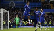 Chelsea players celebrate scoring a goal. (Reuters / Paul Childs)