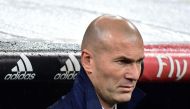 Real Madrid's French coach Zinedine Zidane looks on before the Spanish league football match Real Madrid CF vs Real Sociedad at the Santiago Bernabeu stadium in Madrid on January 29, 2017. / AFP / GERARD JULIEN
