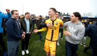 Sutton United players celebrate as fans invade the pitch at the end of the match Action Images via Reuters / Andrew Couldridge