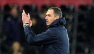 Swansea City manager Paul Clement applauds fans after the game Reuters / Rebecca Naden 
