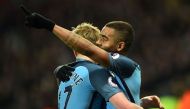 Manchester City's Brazilian striker Gabriel Jesus (R) celebrates scoring his team's third goal with Manchester City's Belgian midfielder Kevin De Bruyne during the English Premier League football match between West Ham United and Manchester City at The Lo
