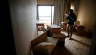 An Iraqi soldier looks at the damages in one of the rooms in the five-star Ninewah Oberoi Hotel in Mosul city, Mosul, Iraq January 30, 2017. Picture taken January 30, 2017. REUTERS/Ahmed Jadallah
