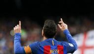  Barcelona's Lionel Messi celebrates after scoring their second goal. (REUTERS/Albert Gea)