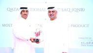 A QNB official receives the ‘Most Innovative Bancassurance Product Qatar 2016’ award, during a ceremony held by the International Finance Magazine (IFM), in Dubai.