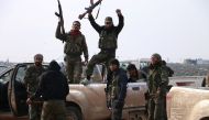 Members of Free Syrian Army are seen after taking control over strategic points of al-Bab town of Aleppo during the 169th day of the 