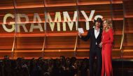 LOS ANGELES, CA - FEBRUARY 12: Recording artists Tim McGraw (L) and Faith Hill speak onstage during The 59th GRAMMY Awards at STAPLES Center on February 12, 2017 in Los Angeles, California. Kevork Djansezian/Getty Images/AFP.