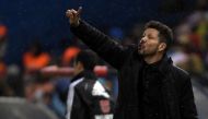 Atletico Madrid's Argentinian coach Diego Simeone shouts instructions to players during the Spanish league football match Club Atletico de Madrid vs RC Celta de Vigo at the Vicente Calderon stadium in Madrid on February 12, 2017. / AFP / CURTO DE LA TORRE