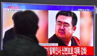 A man watches a television showing news reports of Kim Jong-Nam, the half-brother of North Korean leader Kim Jong-Un, in Seoul on February 14, 2017. Kim Jong-Nam, the half-brother of North Korean leader Kim Jong-Un has been assassinated in Malaysia, South