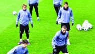 Real Madrid's players take part in a training session at Valdebebas training ground in Madrid yesterday, on the eve of the UEFA Champions League match against Napoli.