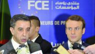 French presidential hopeful Emmanuel Macron (right) and Ali Haddad, head of the forum of business leaders (FCE) speak to the press after meeting with Algerian businessmen in Algiers yesterday. Macron declared that bilateral relations with Algeria, the for