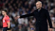 Real Madrid's French coach Zinedine Zidane gestures during the UEFA Champions League round of 16 first leg football match Real Madrid CF vs SSC Napoli at the Santiago Bernabeu stadium in Madrid on February 15, 2017. / AFP / JAVIER SORIANO
