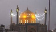 In this photograph taken on June 18, 2014, Pakistani devotees gather at the shrine of 13th century Muslim Sufi saint Lal Shahbaz Qalandar in Sehwan, some 200 kilometres (124 miles) northeast of Karachi. (AFP / YOUSUF NAGORI)