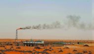 A file picture shows a flame from a Saudi Aramco oil installion known as “Pump 3” near the oil-rich area of Khouris, 160 kilometres east of the Saudi capital Riyadh.
