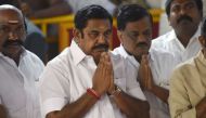 (FILES) In this photograph taken on February 16, 2017, All India Anna Dravida Munnetra Kazhagam (AIADMK) party leader Edappadi Palanisamy (C) gestures as he pays his respects at the memorial for former state chief minister Jayalalithaa Jayaram after being