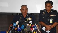  Malaysian Police deputy inspector-general Noor Rashid Ibrahim (L) speaks during a press conference as Selangor state police chief Abdul Samah Mat looks on. Photograph: Mohd Rasfan/AFP.