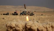 Members of the Iraqi rapid response forces fire a missile toward Islamic State militants during a battle in the south of Mosul, Iraq February 19, 2017. REUTERS/Zohra Bensemra TPX IMAGES OF THE DAY.