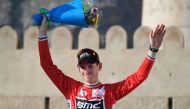 Belgium's Ben Hermans from BMC Racing Team celebrates during the victory ceremony of the 5th stage of the 8th edition of the cycling Tour of Oman between Samail and Jebel Akhdhar on February 18, 2017. / AFP / Eric FEFERBERG
