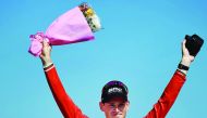 Belgian Ben Hermans celebrates his Tour of Oman victory in Muscat yesterday.