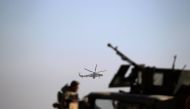 An army military helicopter flies over the Iraqi rapid response forces' position during a battle against Islamic State militants in the south of Mosul, Iraq February 19, 2017. REUTERS/Zohra Bensemra
