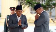  Newly elected Nepalese Prime Minister Pushpa Kamal Dahal, also known as Prachanda, (L) greets outgoing Prime Minister Khadga Prasad Sharma Oli (R) upon their arrival during the administers of oath of office to the newly-elected Prime Minister at the pres