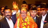 FILE PHOTO: Nepal's newly elected Prime Minister Pushpa Kamal Dahal, also known as Prachanda, waves towards the media after he was elected Nepal's 24th prime minister in 26 years, in Kathmandu, Nepal, August 3, 2016. REUTERS/Navesh Chitrakar/File Photo RE