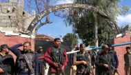 Police are hunting a suicide bomber believed to be on the loose inside a Pakistani court complex, officials said Tuesday, after a second was killed by security forces and a third detonated outside the main gates.
Photo: Reuters