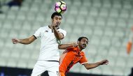 Al Sadd defender Ibrahim Majid (left) heads the ball during a Qatar Stars League match in this file photo.