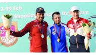 France’s Anthony Terras, winner of the skeet event at the Qatar Open Shotgun championship, celebrates on the podium along with silver medal winner Qatar’s Nasser Saleh bin Al Attiyah (left) and third place winner Anton Astakhov of Russia.