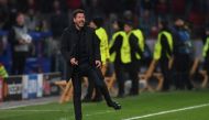 Atletico Madrid's Argentinian coach Diego Simeone reacts during the UEFA Champions League round of 16 first-leg football match between Bayer 04 Leverkusen and Club Atletico de Madrid in Leverkusen, western Germany on February 21, 2017. / AFP / PATRIK STOL