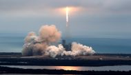 A SpaceX Falcon 9 rocket disappears into clouds after it lifted off on a supply mission to the International Space Station from historic launch pad 39A at the Kennedy Space Center in Cape Canaveral, Florida, U.S., February 19, 2017. REUTERS/Joe Skipper
