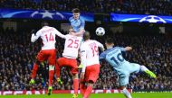 Manchester City's Argentinian striker Sergio Aguero (right) scores their third goal during the UEFA Champions League Round of 16 first-leg football match against Monaco at the Etihad Stadium in Manchester on Tuesday.