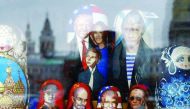 Russian traditional Matryoshka wooden dolls with images of Russian President Vladimir Putin, U.S. President Donald Trump together with family members, Soviet leaders Vladimir Lenin and Joseph Stalin are on sale at a gift kiosk in a street in Moscow, Russi