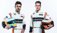 McLaren Honda driver Stoffel Vandoorne (right) and team-mate Fernando Alonso posing for a picture yesterday.